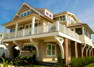 A large house with a balcony and porch.