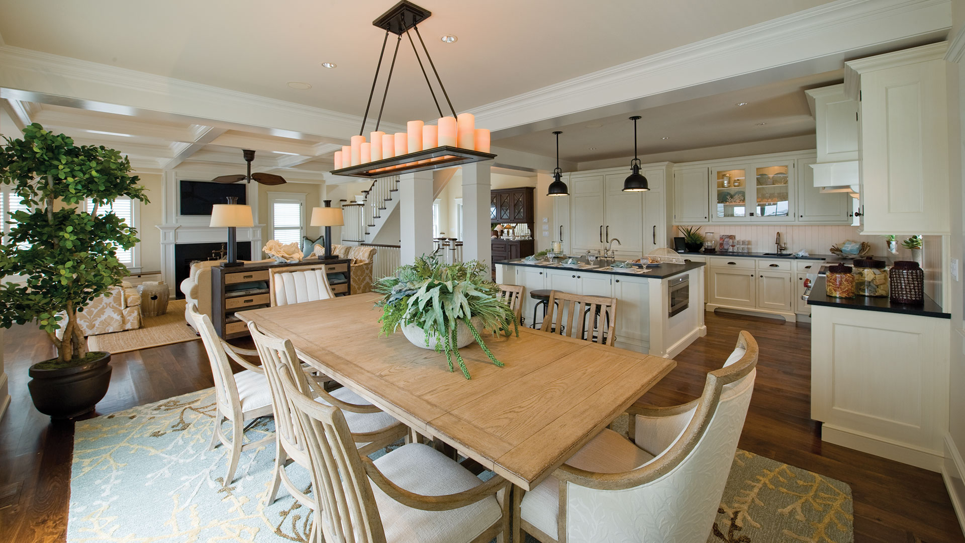 A large dining room table with chairs around it.