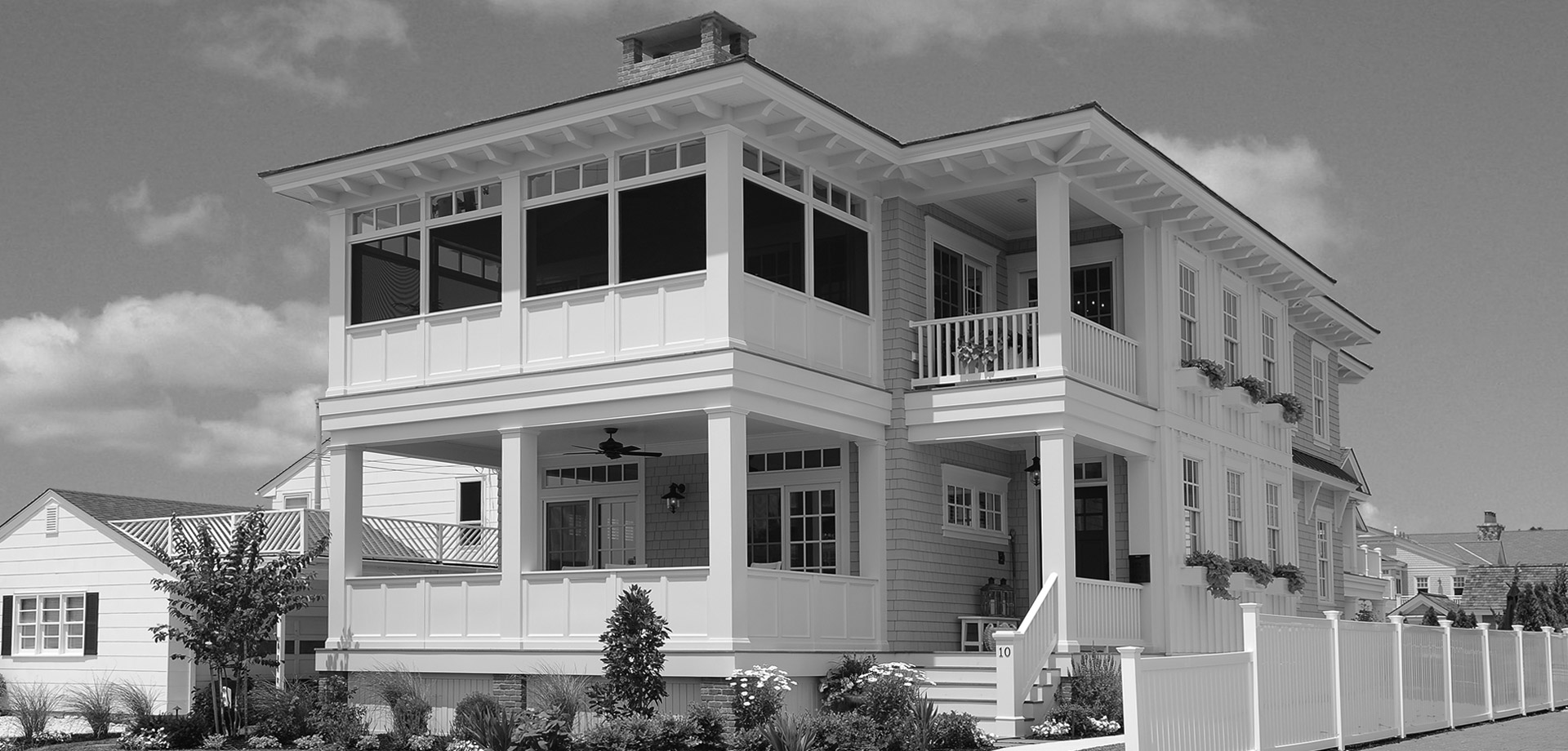 A large white house with lots of windows.