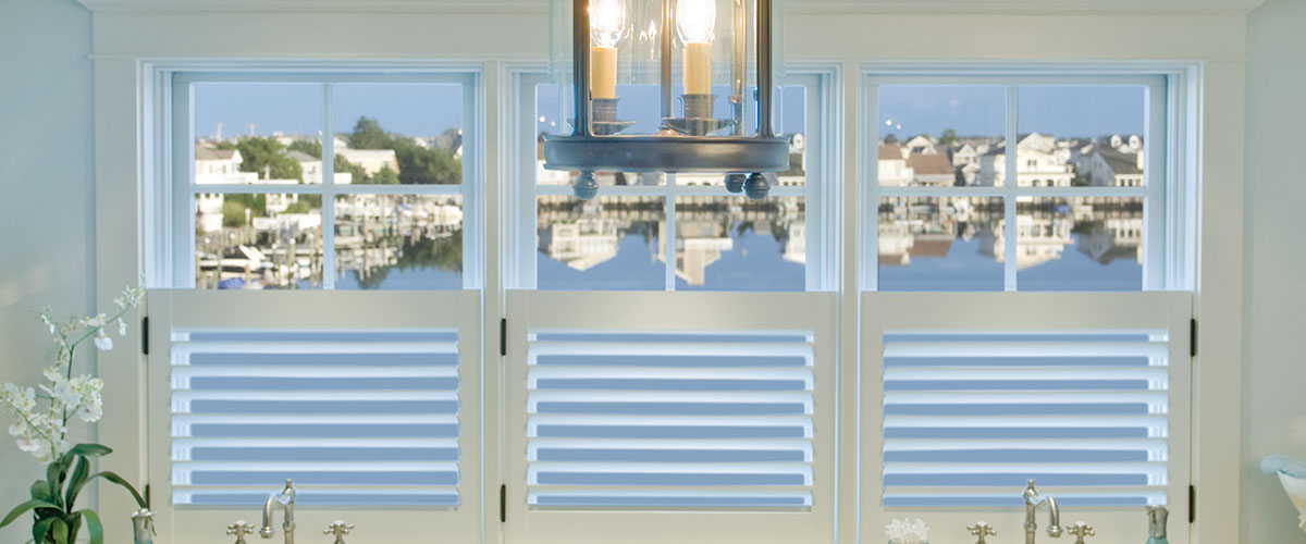 A view of a harbor from inside the house.